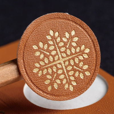 High Quality Self Adhesive Leather Embossed Textured Pu Labels Candle Aromatherapy Labels Leather Labels With Stickers